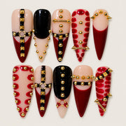 ACEGRIP Blush Beaded press-on nails in peach nude, red, black, and gold tones, with small bead accents, style AN8037