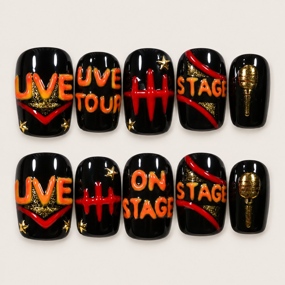 ACEGRIP Onyx Backstage press-on nails in black, orange, red, and gold tones, with music-inspired motifs, style AN8043