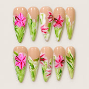 ACEGRIP Blush Petals press-on nails in peach nude, pink, green, and white, with floral accents, style AN8054
