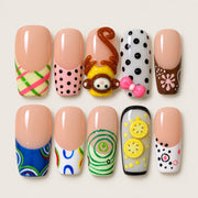 ACEGRIP Blush Spirals press-on nails in peach nude, green, blue, and white, with spiral patterns, style AN8079