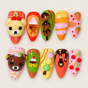 ACEGRIP Clementine Companions press-on nails in orange, green, pink, and yellow, with animal accents, style AN8086