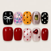ACEGRIP Onyx Dots press-on nails in black, pink, orange, and red, with polka dots, style BF4032