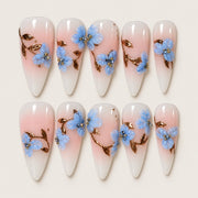 ACEGRIP Blush Petal Branches press-on nails in peach nude, white, blue, and gold tones, with floral accents, style CL12038