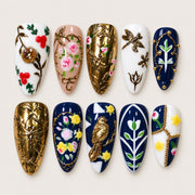 ACEGRIP Ivory Blossoms press-on nails in white, peach nude, navy blue, and gold tones, with floral accents, style CL1212