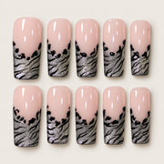 ACEGRIP Blush Zebra French press-on nails in peach nude, black, and silver tones, with zebra-like stripes, style CL1227