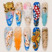 ACEGRIP Azure Coast press-on nails in blue, peach nude, white, and gold tones, with ocean-inspired motifs, style DC6009