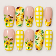 ACEGRIP Blush Sunflowers press-on nails in peach nude, yellow, white, and green, with sunflower motifs, style DC6010