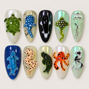 ACEGRIP Cream Seaside press-on nails in cream, green, blue, and black, with ocean-inspired motifs, style DC6030