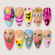 ACEGRIP Blush Constellation press-on nails in peach nude, yellow, blue, and pink, with star motifs, style DC6055