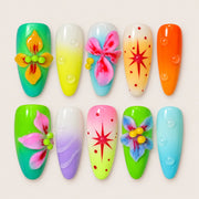 ACEGRIP Jade Petal Starburst press-on nails in green, pink, yellow, and blue, with floral accents, style DX7048