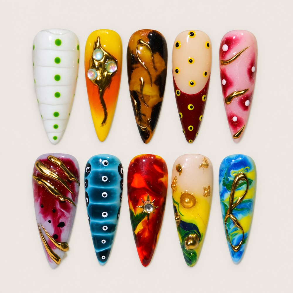 ACEGRIP Ivory Marble press-on nails in white, yellow, black, and pink, with marbled-looking swirls, style DX7056