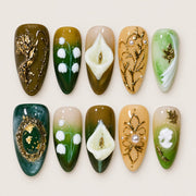 ACEGRIP Cocoa Garden press-on nails in brown, green, peach nude, and gold tones, with floral accents, style DX7071
