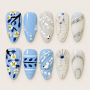 ACEGRIP Azure Garden press-on nails in blue, white, and silver tones, with floral accents, style DX7077