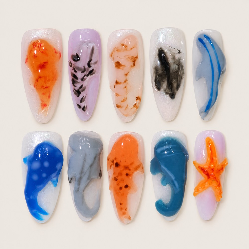 ACEGRIP Ivory Marble Seaside press-on nails in white, purple, orange, and blue, with marbled-looking swirls, style DX7093