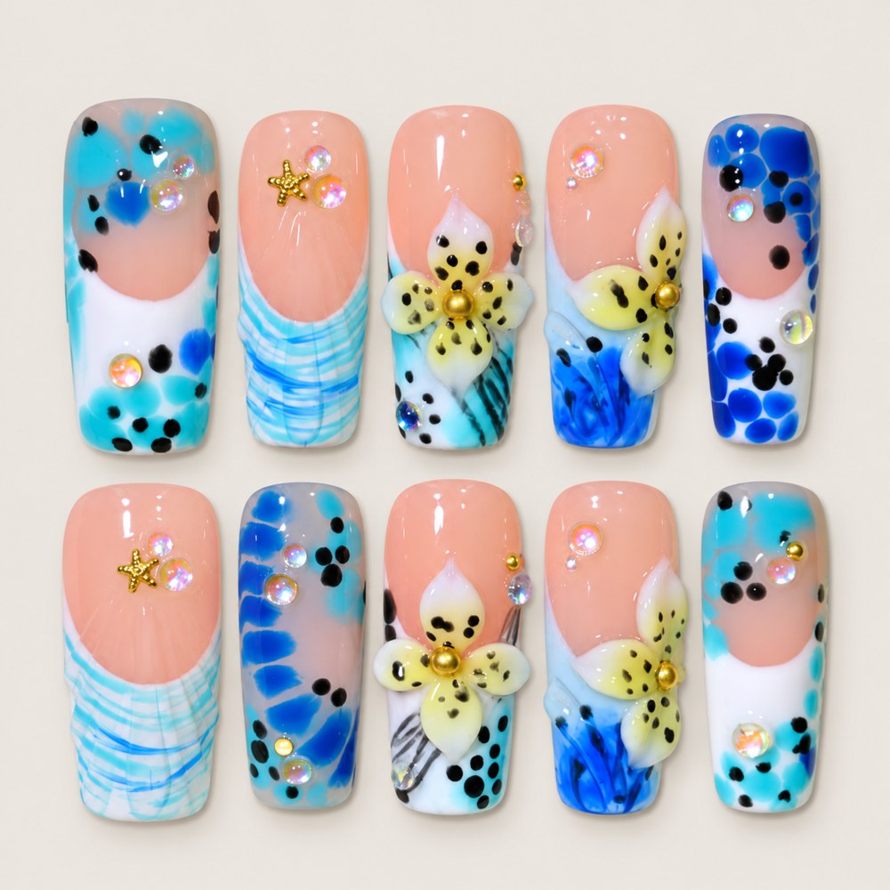ACEGRIP Blush Petal Spotted press-on nails in peach nude, blue, yellow, and black, with floral accents, style DX7113