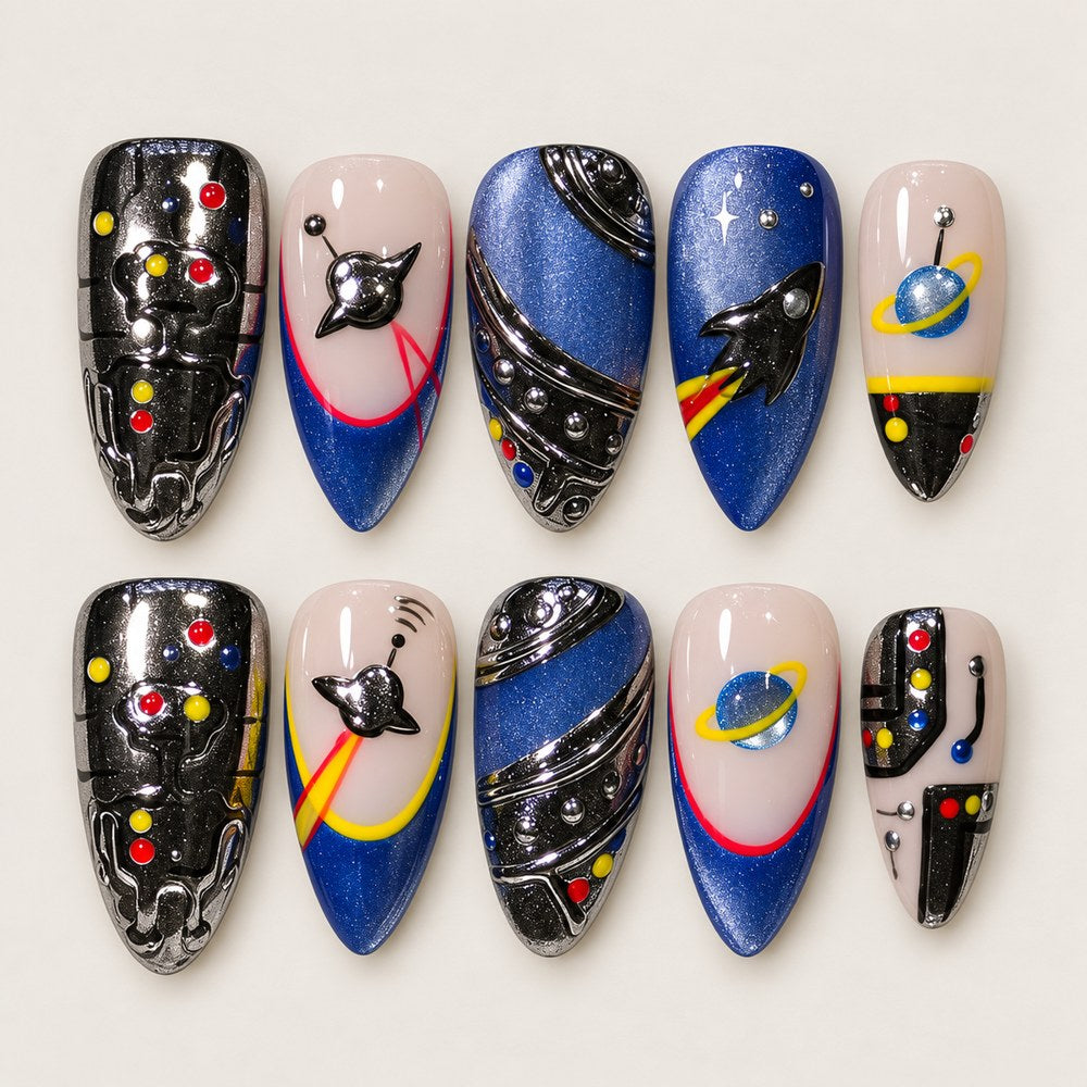 ACEGRIP Onyx Orbit press-on nails in black, blue, peach nude, and silver tones, with planet motifs, style FD9012