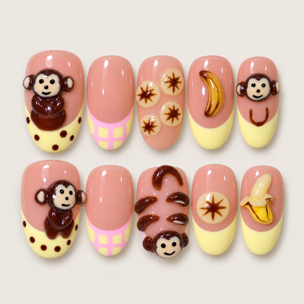 ACEGRIP Blush Monkey Banana press-on nails in peach nude, brown, yellow, and pink, with monkey motifs, style FD9037