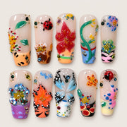 ACEGRIP Blush Petal Insect Garden press-on nails in peach nude, multiple bright colors, and black, with floral accents, style FD9047