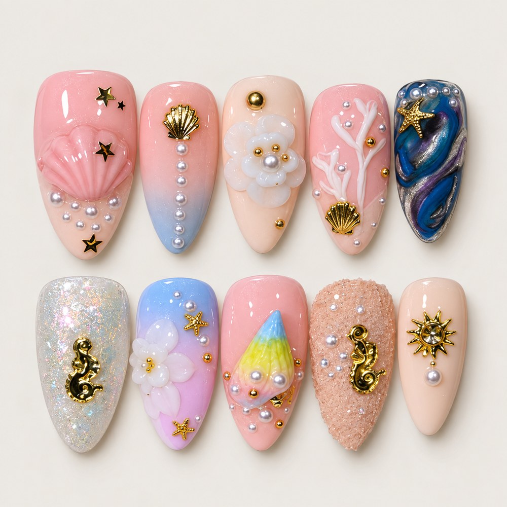 ACEGRIP Rose Seaside Shells press-on nails in pink, blue, white, and gold tones, with ocean-inspired motifs, style FD9055