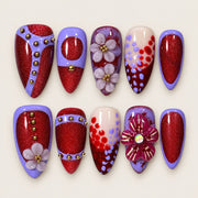 ACEGRIP Violet Bloom press-on nails in purple, red, peach nude, and gold tones, with floral accents, style FD9060