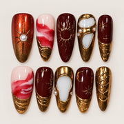 ACEGRIP Cocoa Cameo press-on nails in brown, red, peach nude, and gold tones, with ornamental frames, style FD9072