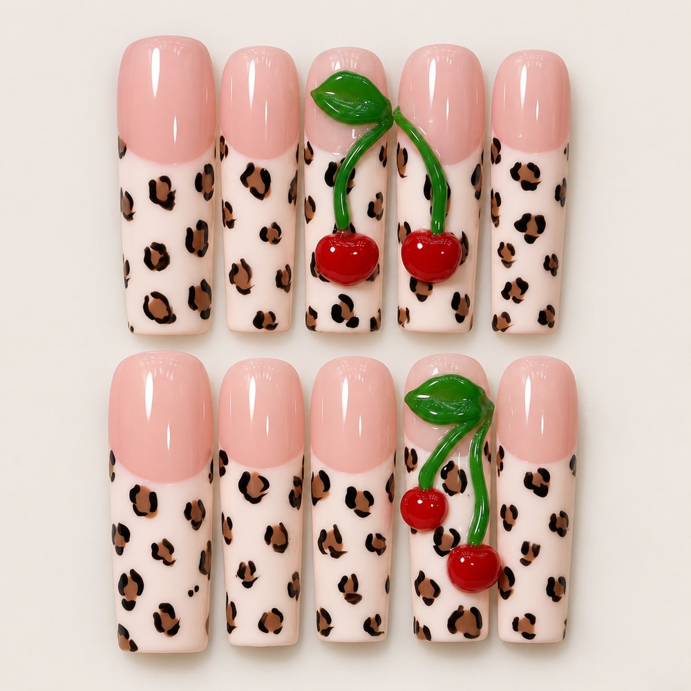 ACEGRIP Blush Spotted press-on nails in peach nude, pink, black, and red, with leopard-like spots, style FD9079