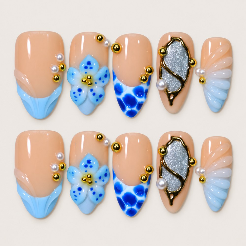 ACEGRIP Blush Bloom Spotted press-on nails in peach nude, blue, and gold tones, with floral accents, style HM5007