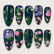 ACEGRIP Midnight Bloom press-on nails in navy blue, green, pink, and white, with floral accents, style HM5052