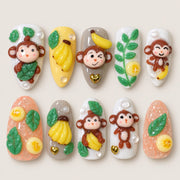 ACEGRIP Blush Monkey Leaves press-on nails in peach nude, yellow, white, and green, with monkey motifs, style JH13014