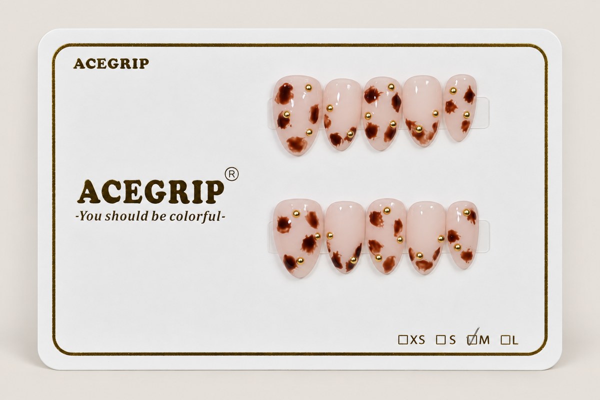 ACEGRIP Blush Spotted Studded, style WE16001, complete 10-nail set on its presentation card