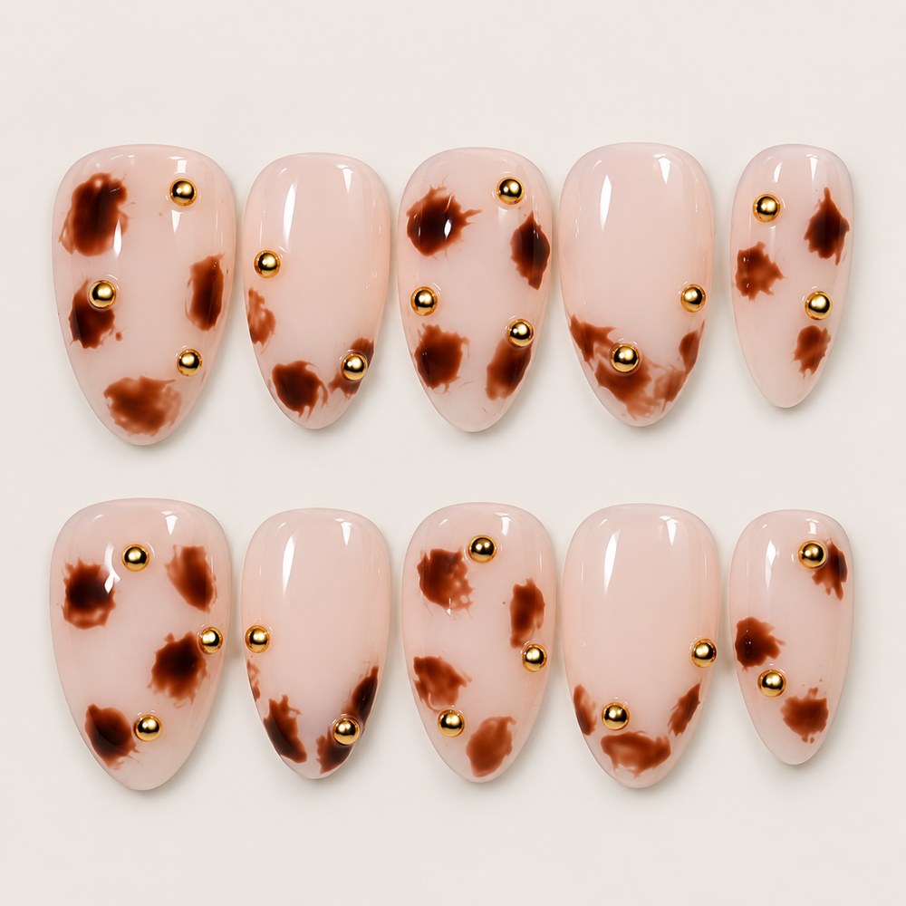 ACEGRIP Blush Spotted Studded press-on nails in peach nude, brown, and gold tones, with leopard-like spots, style WE16001