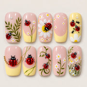 ACEGRIP Rose Ladybug press-on nails in pink, peach nude, yellow, and green, with ladybug motifs, style XQ2017