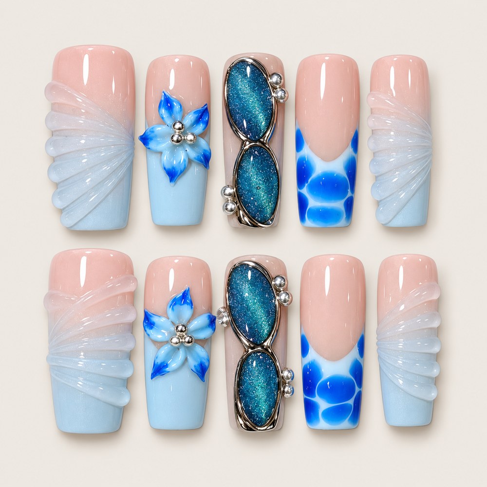 ACEGRIP Blush Blossom Shells press-on nails in peach nude, blue, white, and silver tones, with floral accents, style XQ2032