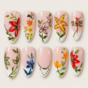 ACEGRIP Blush Garden Foliage press-on nails in peach nude, white, and multiple bright colors, with floral accents, style XQ2035
